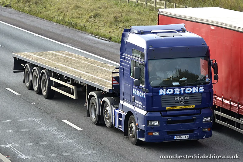 Articulated HIAB returning with an empty trailer