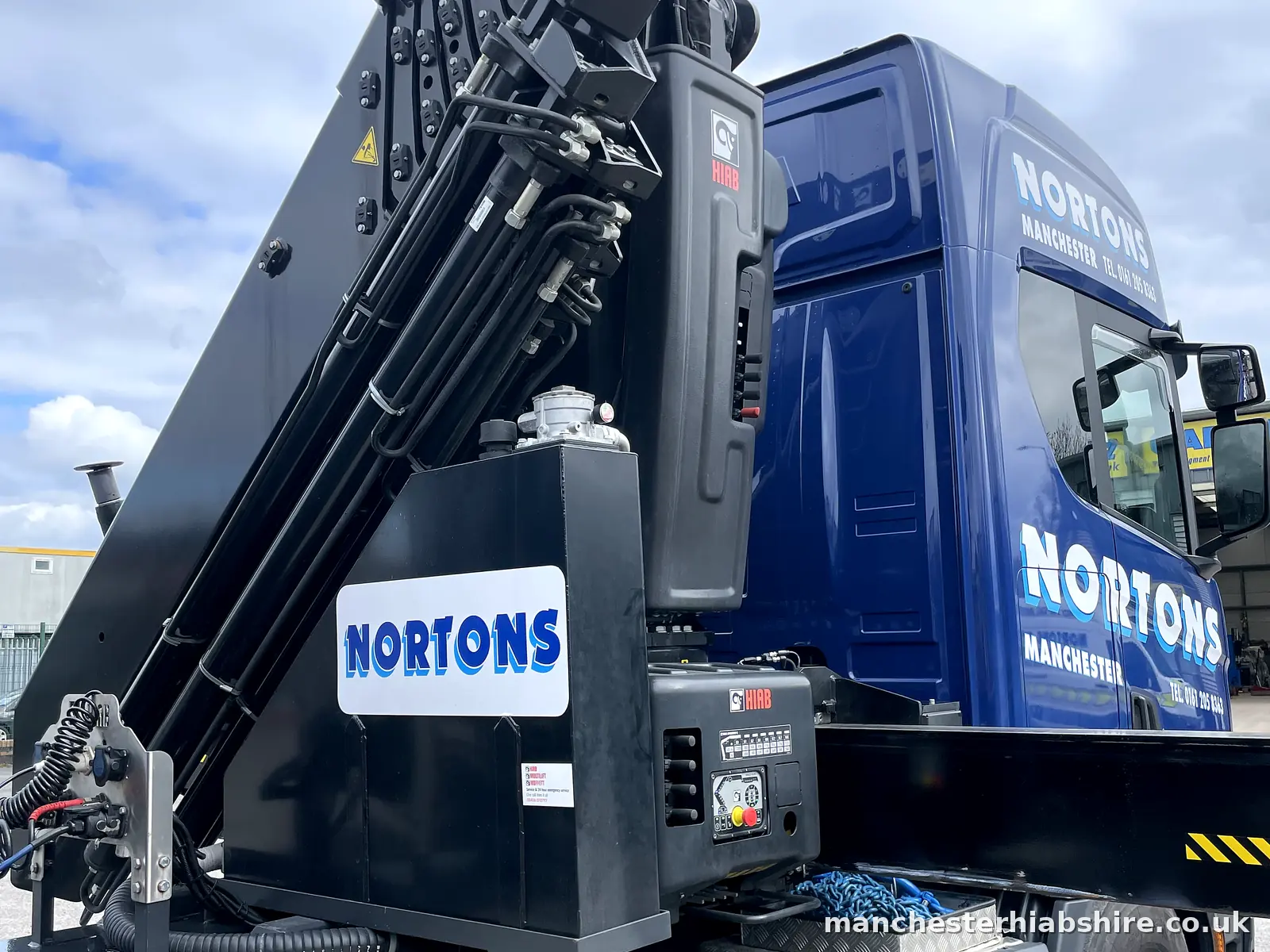 Articulated HIAB unit with the lorry mounted crane folded behind the cab