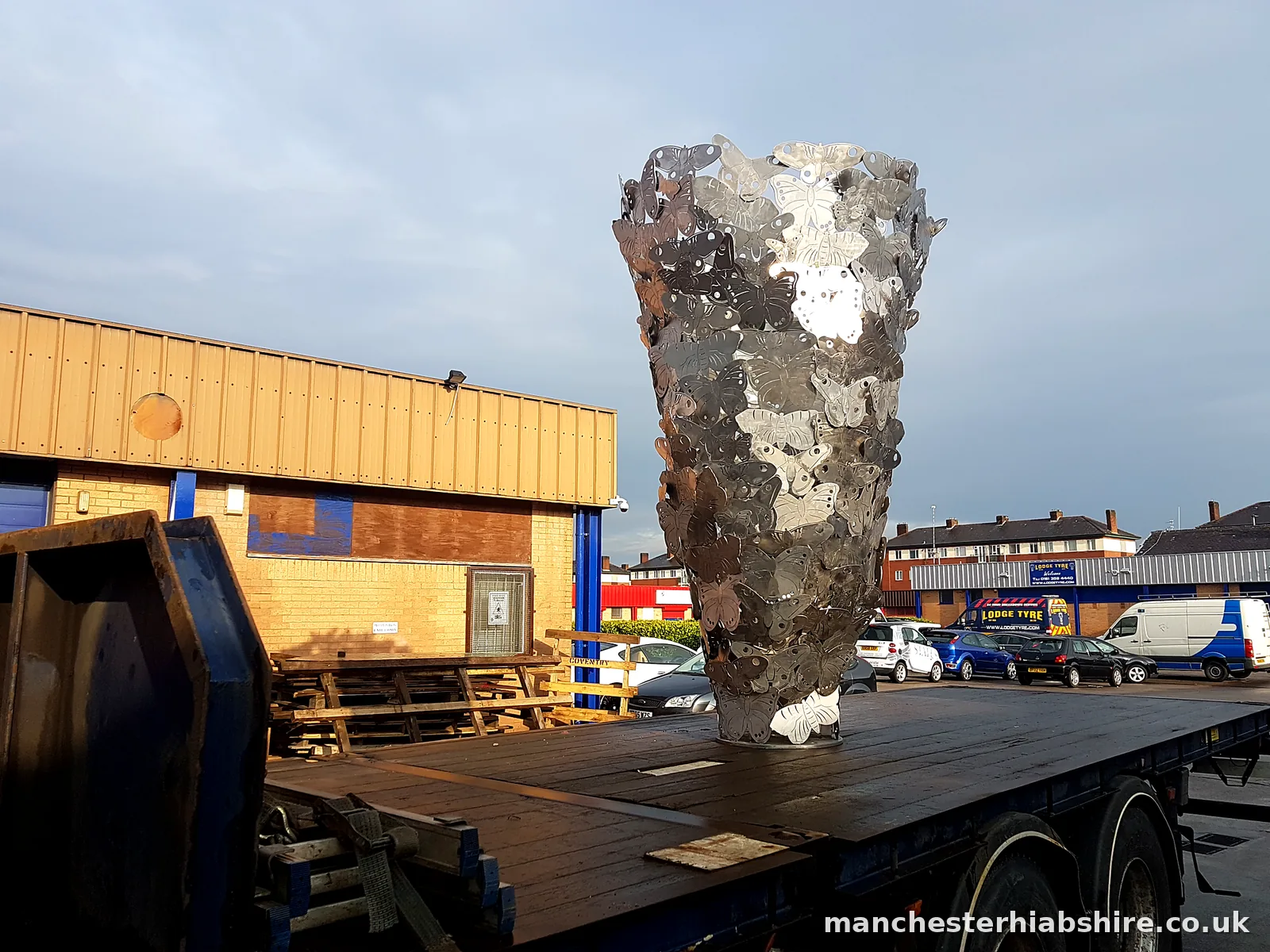 Sculpture loaded on the HIAB flatbed for relocation