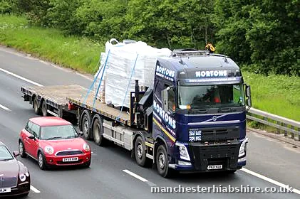 Wrapped electrical panels loaded on the lorry on the M6