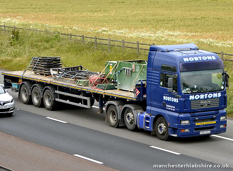 Loaded HIAB lorry on the M6 near Cranage