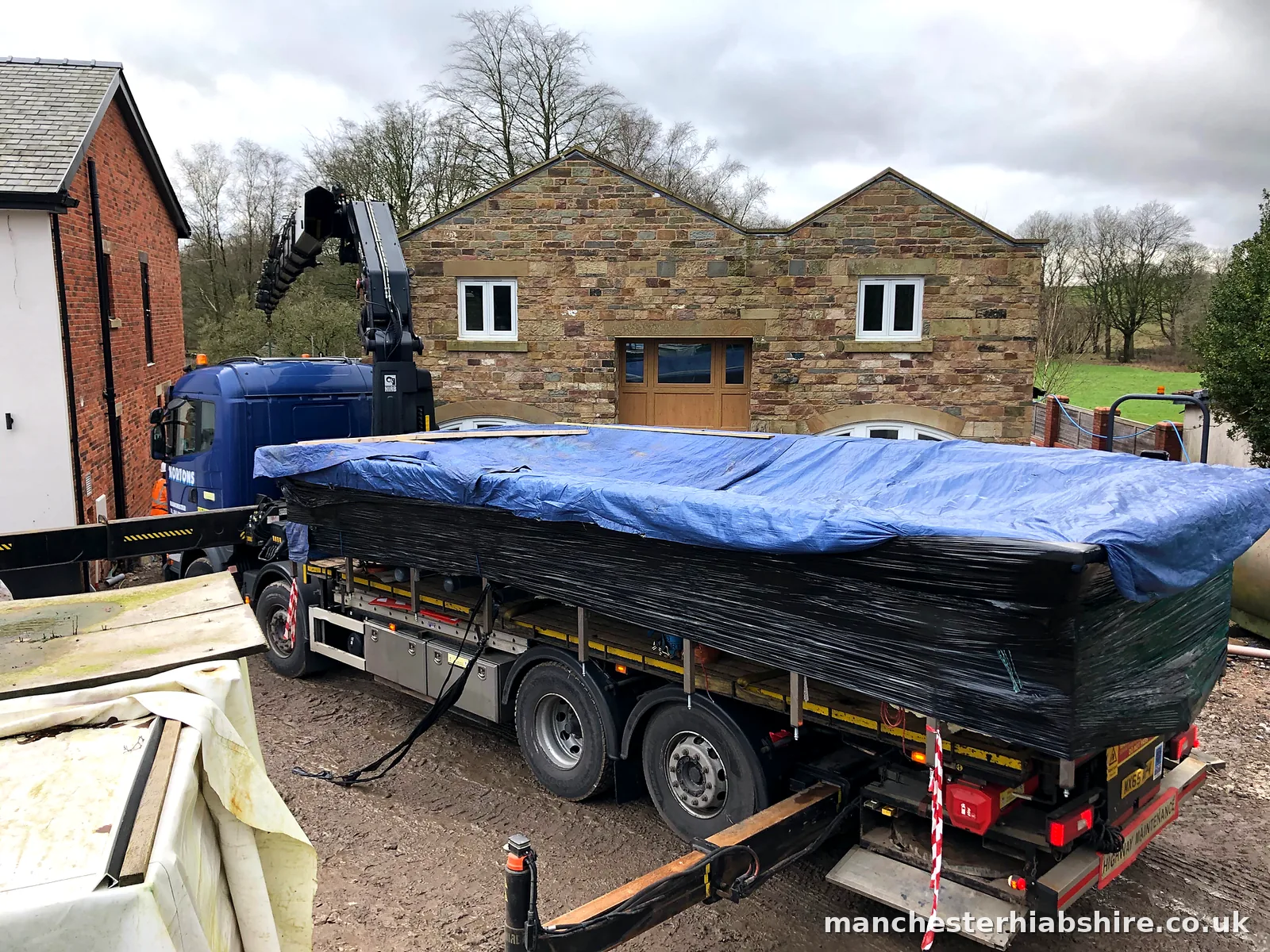 Pool shell lifted clear on the HIAB