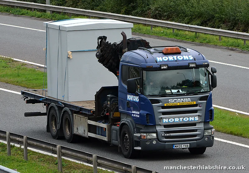 One grey unit carried on the bed of a HIAB lorry