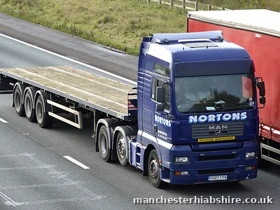 Articulated HIAB returning with an empty trailer