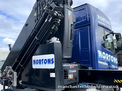 Articulated HIAB unit with the lorry mounted crane folded behind the cab