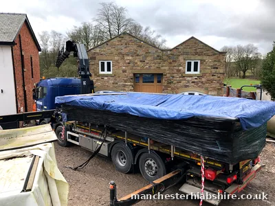 Pool shell lifted clear on the HIAB