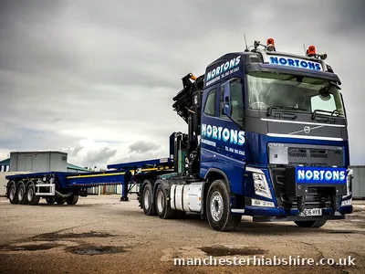 HIAB lorry and trailer photographed side on in the yard