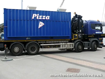 Kiosk unit loaded on the lorry bed with stabilisers down