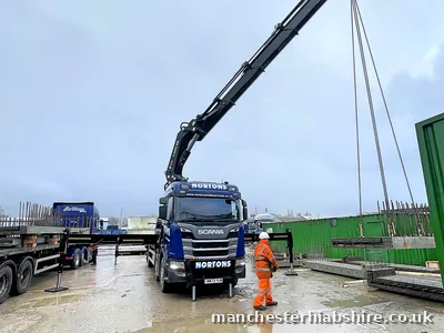 Rigid HIAB lorry with the lorry mounted crane folded behind the cab