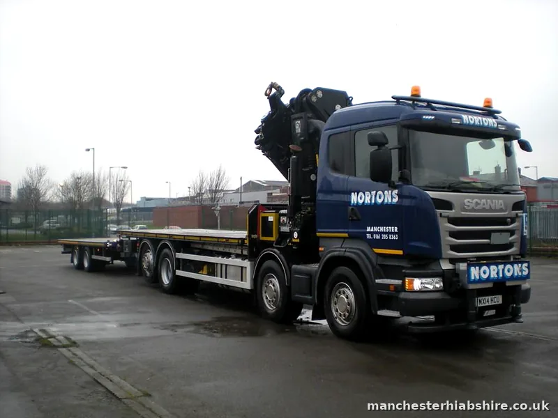 Eight wheel HIAB lorry with a flat trailer, full rig side on